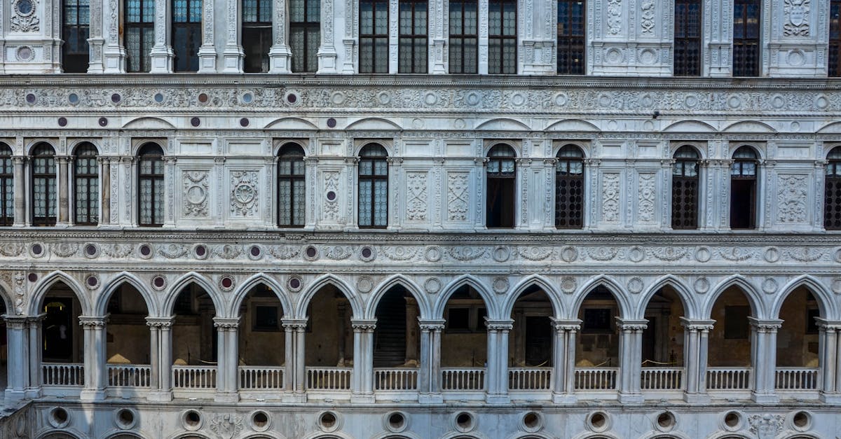 Detailed view of Renaissance architecture with arches and windows in Venice, Italy.