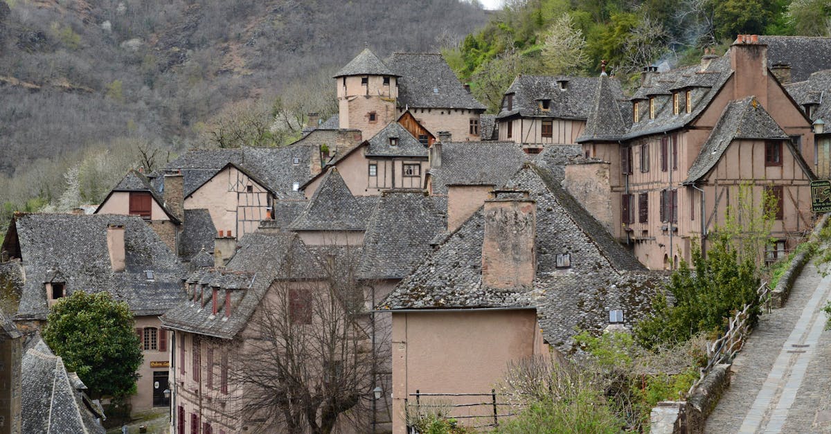 Explore this traditional medieval village with unique slate-roofed houses and stunning architecture.