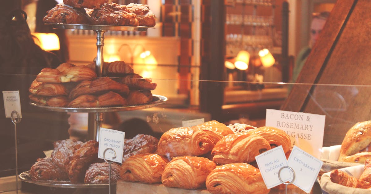 Freshly baked croissants and pastries displayed in a cozy New York City bakery.