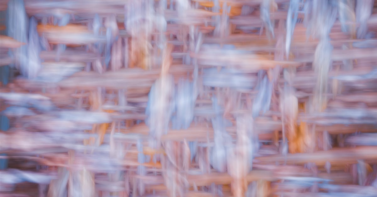 A captivating abstract image featuring a blend of woven textures with soft, muted colors.