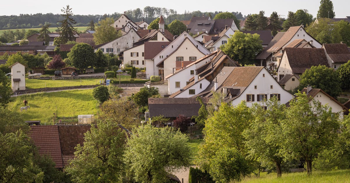 Scenic view of a picturesque village surrounded by greenery in spring.
