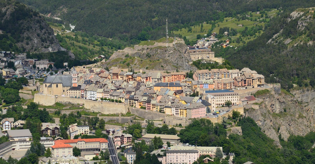 Drone shot of the historic fortified city of Briançon, nestled in the picturesque French Alps.