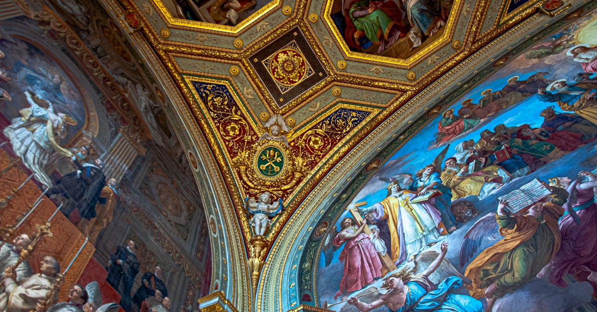 Explore the stunning frescoes and ornate decorations of the Vatican Museum's ceilings.