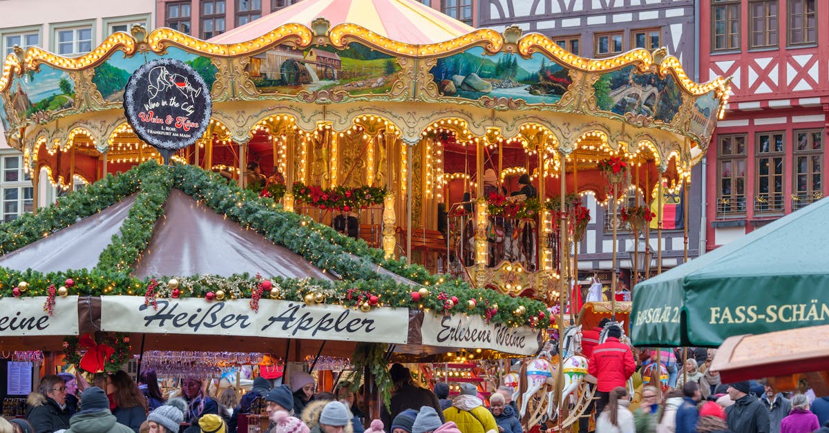 Vibrant carousel at a festive holiday market with bustling crowds.