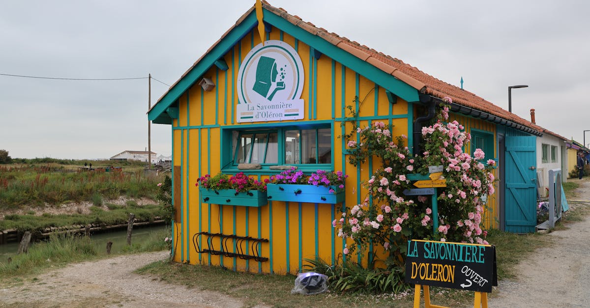 Colorful soap shop with flowers on Île d'Oléron, France, inviting and picturesque.