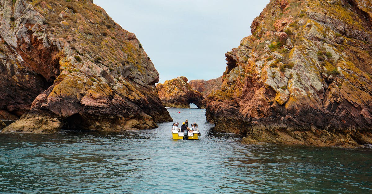 Explore picturesque boating between rocky cliffs in Berlengas, Portugal.