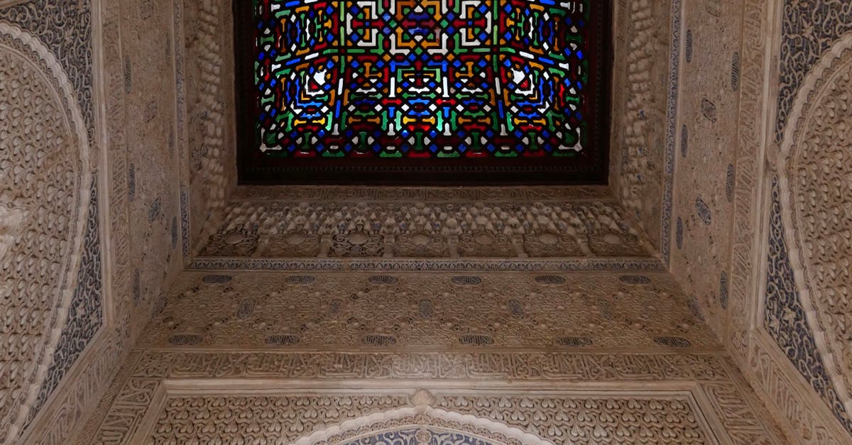 Intricate Moorish architecture with a vibrant stained glass ceiling, capturing historic craftsmanship.