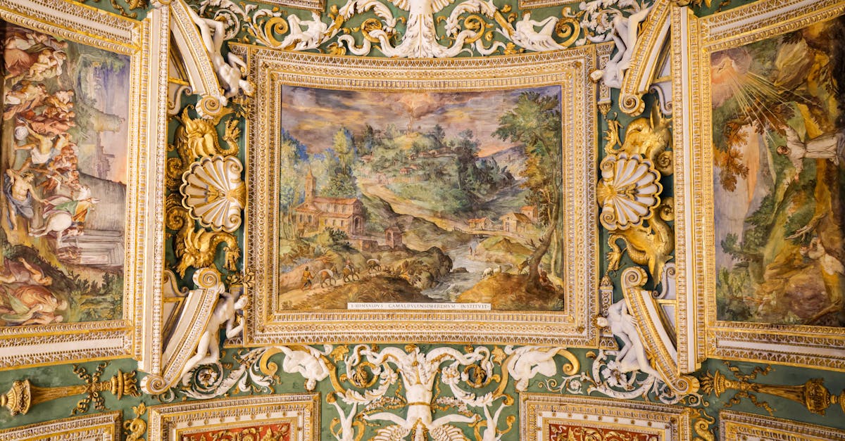 Detailed fresco paintings adorned with gold embellishments on a Roman architectural ceiling.