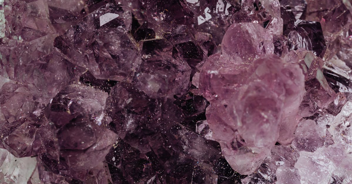 Detailed close-up of amethyst crystals showcasing their rich textures and deep colors.
