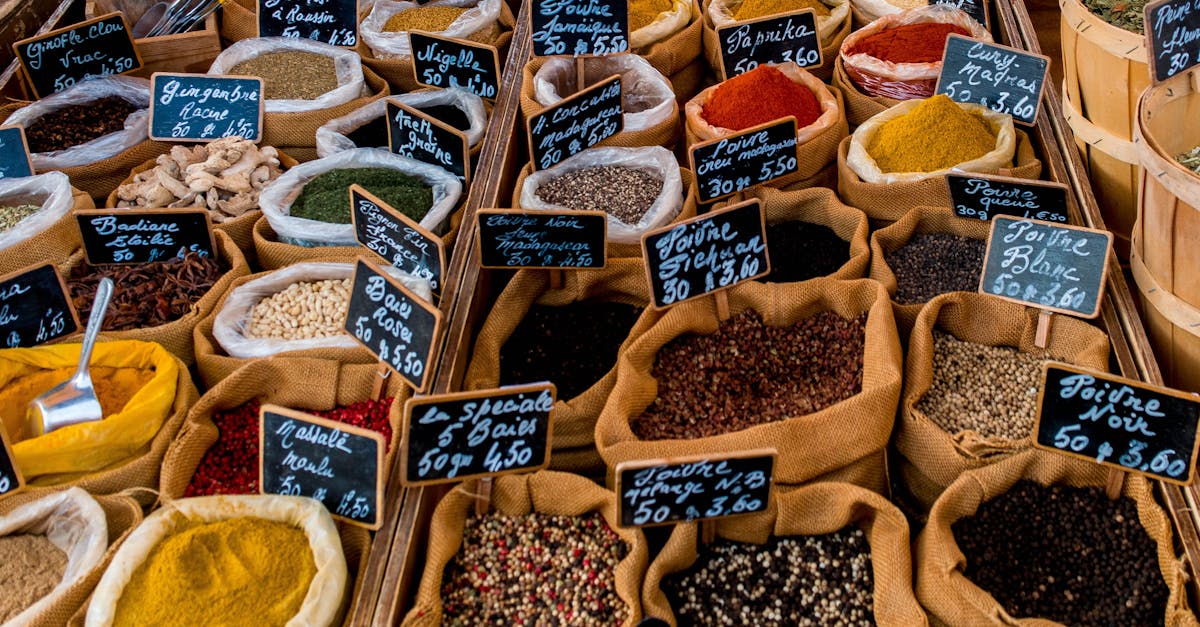 A vibrant array of spices displayed in sacks at a market in Montpellier, France.