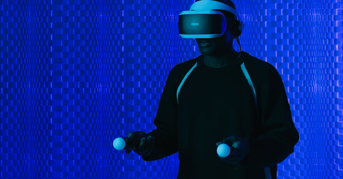 A man wearing a VR headset and using controllers immersed in a futuristic setting.