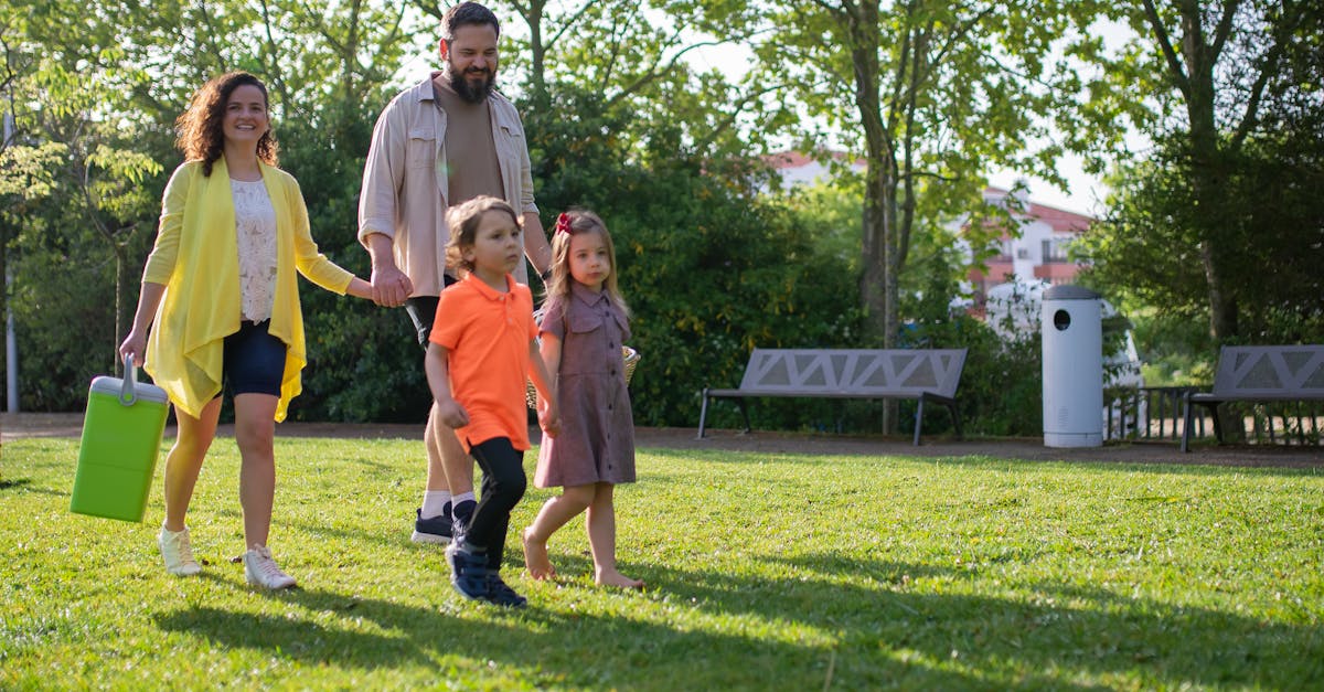 A joyful family with children strolling in a sunny Portuguese park.