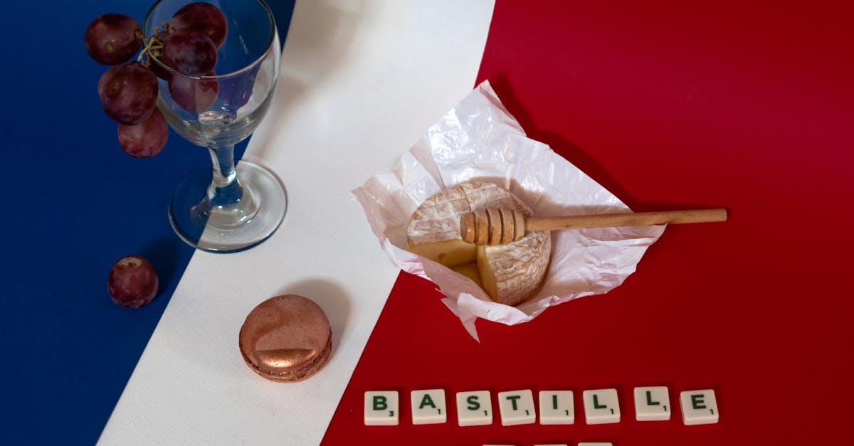 Celebrate Bastille Day with French wine, cheese, and grapes.