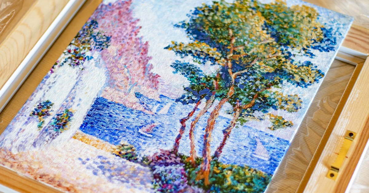 A close-up of an impressionist landscape painting depicting a serene lakeside scene on canvas.